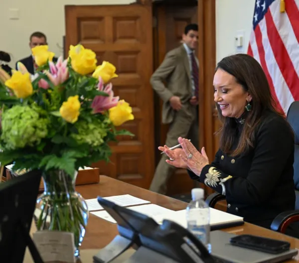 Department of Agriculture Secretary Brooke Rollins sitting at her desk