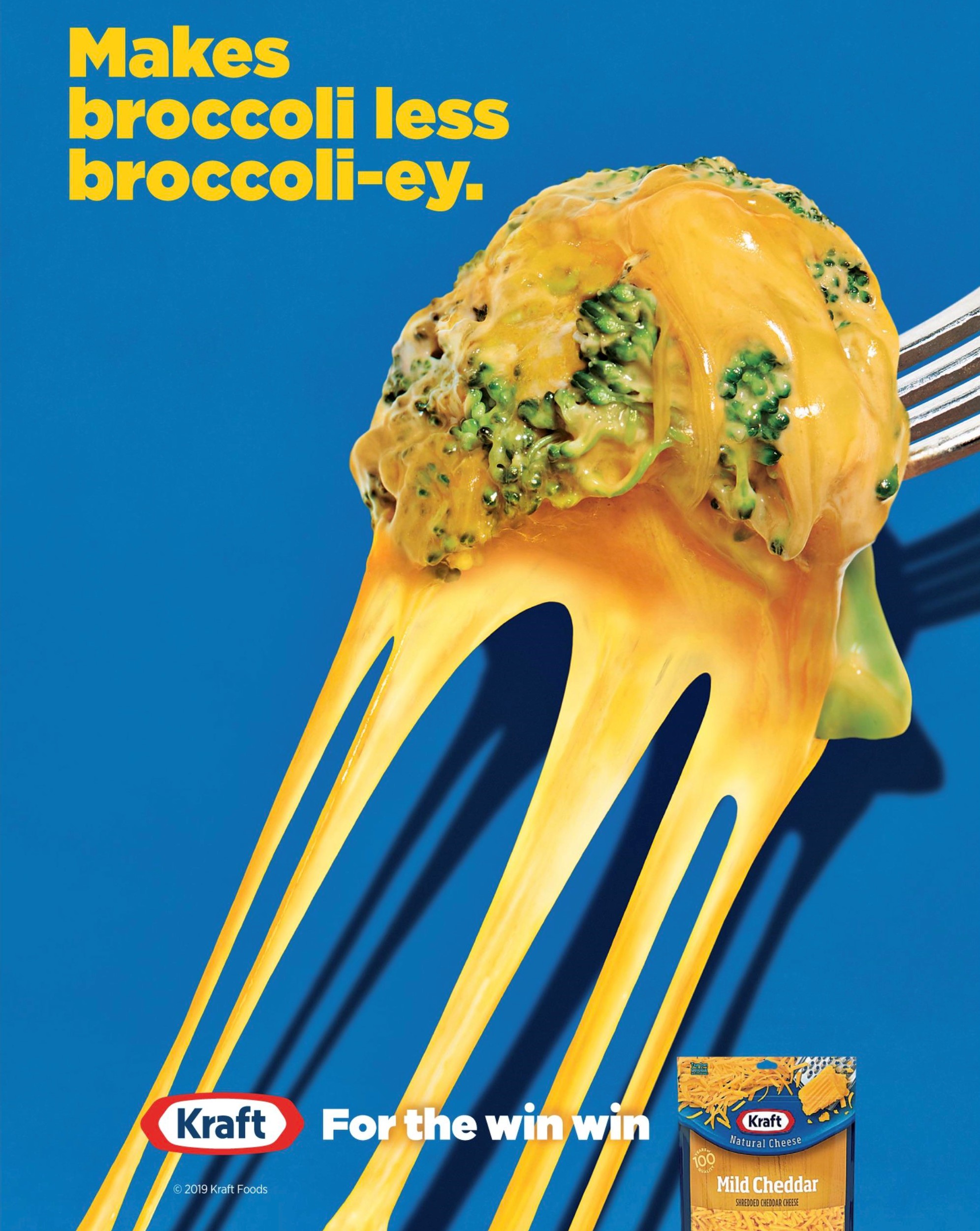 A print ad for Kraft shredded cheese. It features a floret of broccoli covered in melted cheese with the words A print ad for Kraft shredded cheese. It features a floret of broccoli covered in melted cheese with the words
