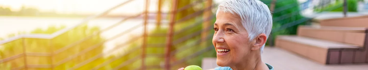 A woman with an apple