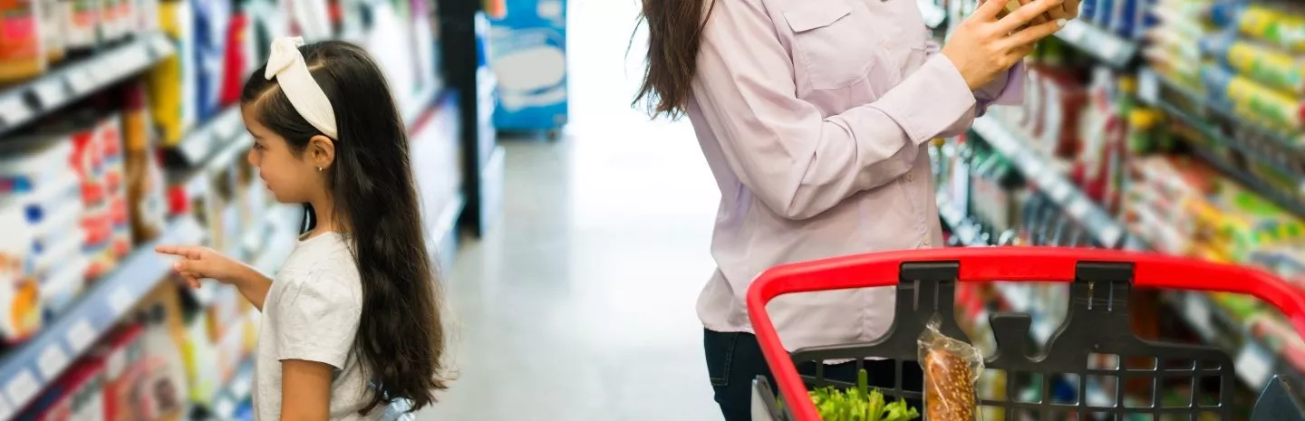 A child and parent shop for groceries