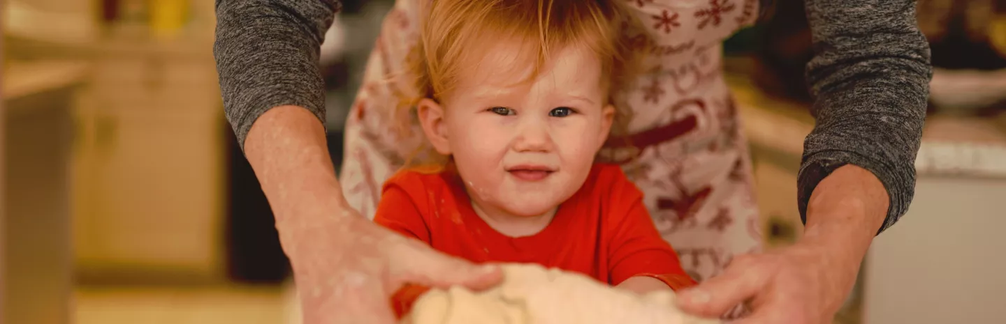 Grandmother baking with grandchild