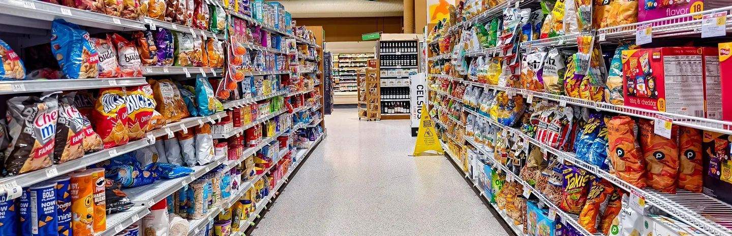 Ultraprocessed foods in a grocery store aisle