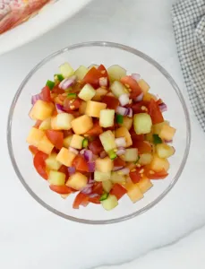 a bowl of melon salsa