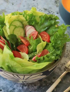 bowl of salad greens and vegetables