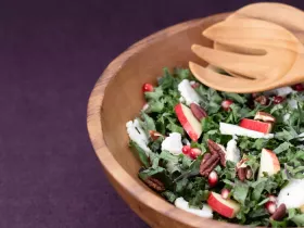 kale salad with fruit and nuts