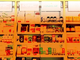 image of supplements on store shelves with an orange hue