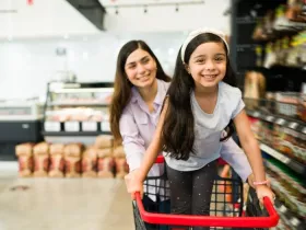 A woman and girl grocery shop