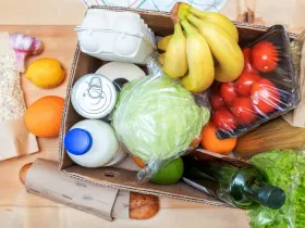 A box of perishable and non-perishable food items for donation