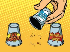 comic style cartoon of a hand lifting 1 one of three cups labeled "brain boost". the other cups labeled "live longer" and "natural cure"