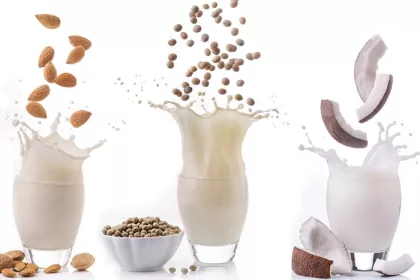 various milks splashing in cup