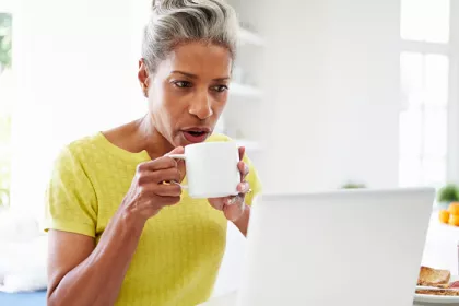 a woman drinking coffee