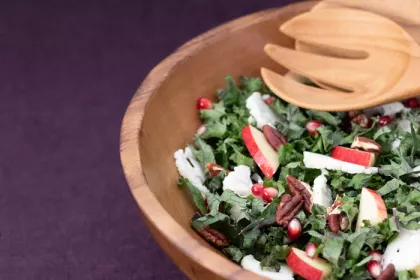 kale salad with fruit and nuts