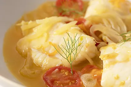 poached white fish in tomato broth