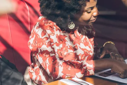 a woman ordering food in a restaurant