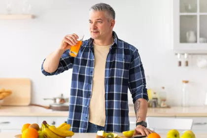 man drinking juice