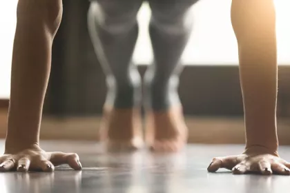 person doing straight-arm plank exercise