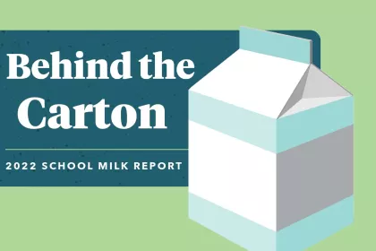 Milk carton with "Behind the Carton: 2022 School Milk Report" text