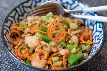 Bowl filled with various vegetables and fried rice