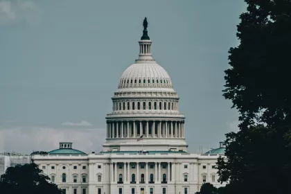 The U.S. Capitol Building with a hazy sky behind it