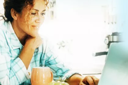 woman looking at laptop screen