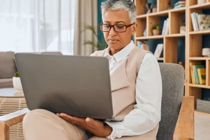 woman looking at laptop
