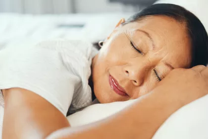 woman's head on a pillow, sleeping