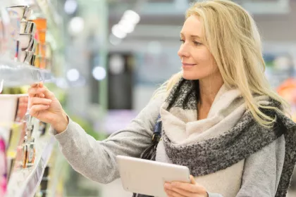 woman looking at store shelves