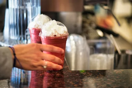 Berry frappe drink with whipped cream