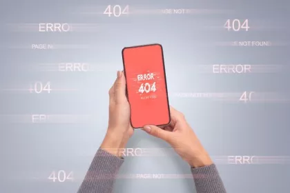Hands holding smart phone with error 404 or not found icon
