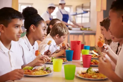 Children eating school lunch