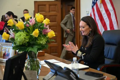 Department of Agriculture Secretary Brooke Rollins sitting at her desk
