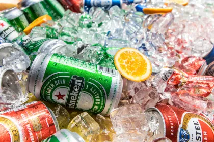 Cans of beer on ice.