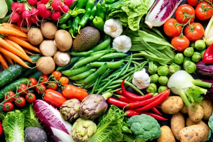 Food background with assortment of fresh organic vegetables