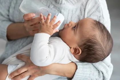 Baby drinking formula