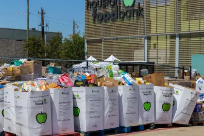 Local charity food bank preparing food kits during national emergency