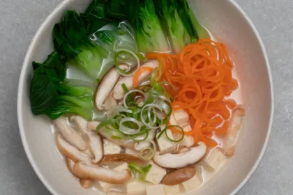 bowl filled with vegies sitting in miso broth