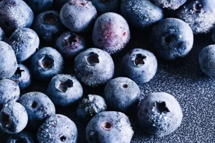 Frozen blueberries closeup with frost texture