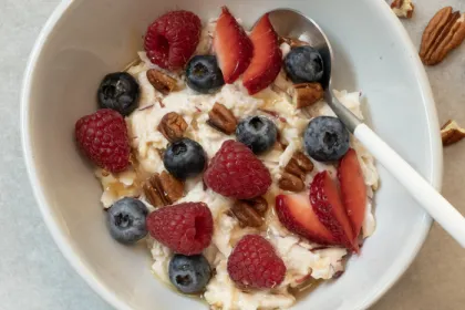 white bowl with berries and overnight oats