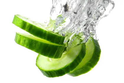 cucumber slices splashing into water