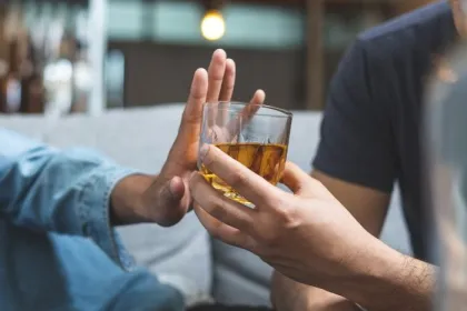 Stop alcohol concept. Person refuses to drink alcohol.