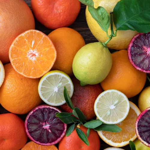 Seasonal produce - a variety of citrus fruit, including limes, lemons, tangerines, grapefruit, oranges, and clementines