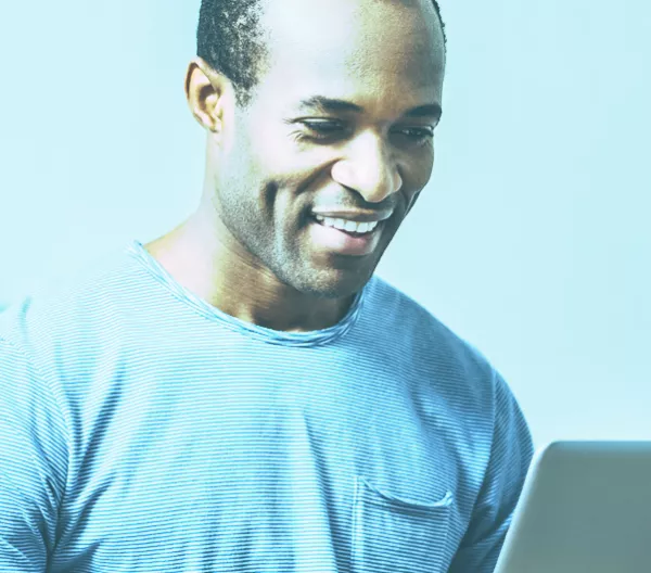man looking at computer screen