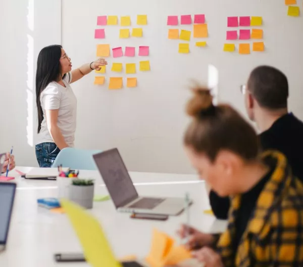 a group of people having a meeting
