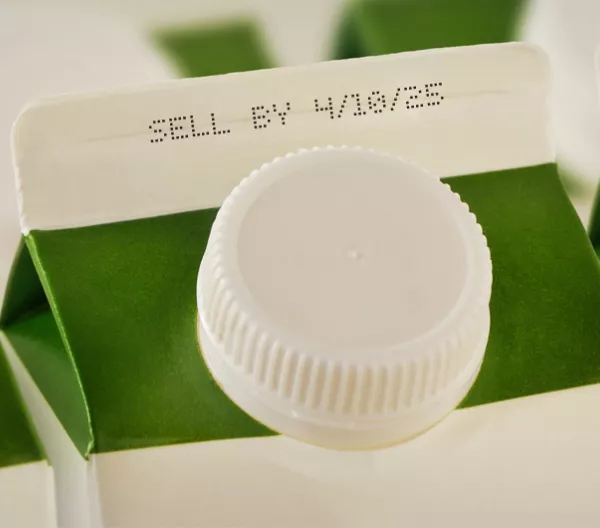 milk cartons showing a sell-by date