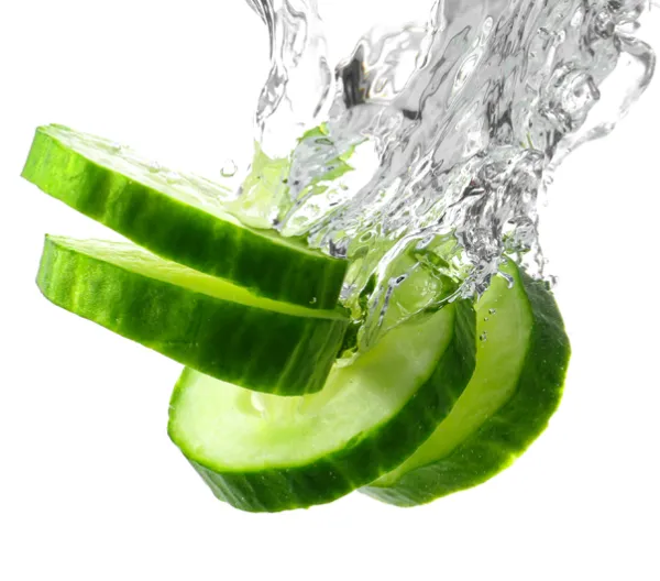 cucumber slices splashing into water