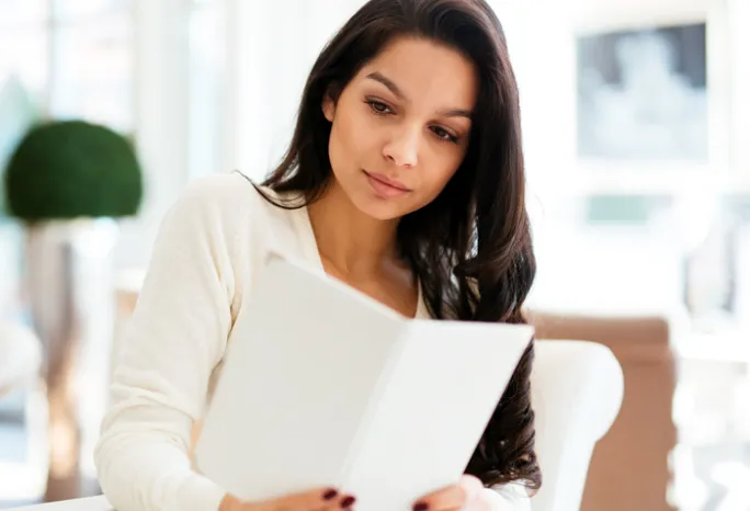 woman reading a menu