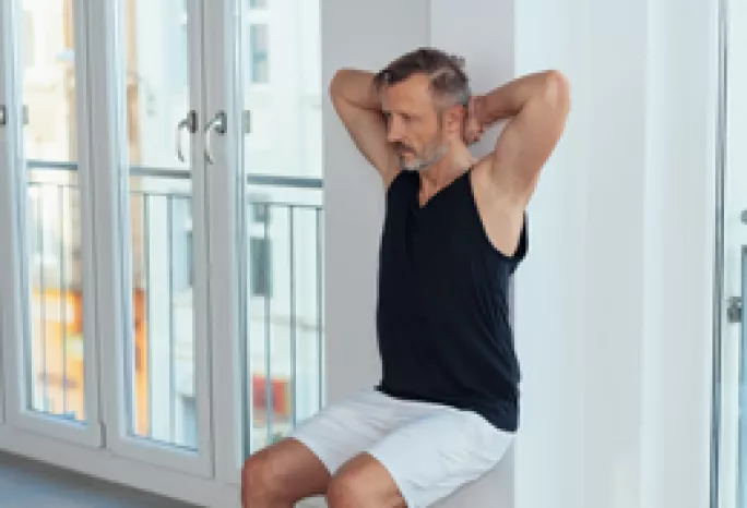 man doing knee exercises