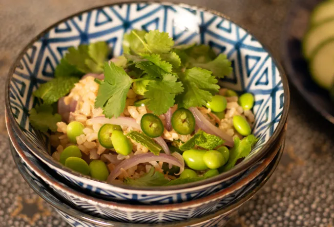 Bowl of thai style fried rice on wood background