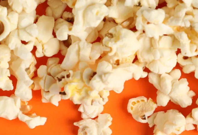 popcorn on orange background