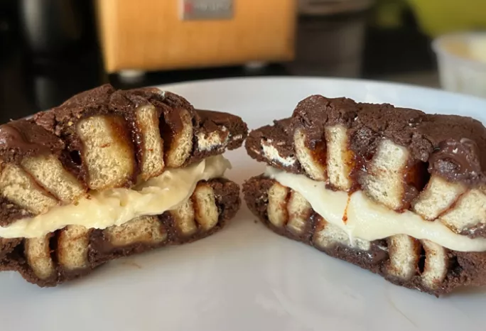 Cinnabon S'mores Cookie BonBite cut in half down the middle
